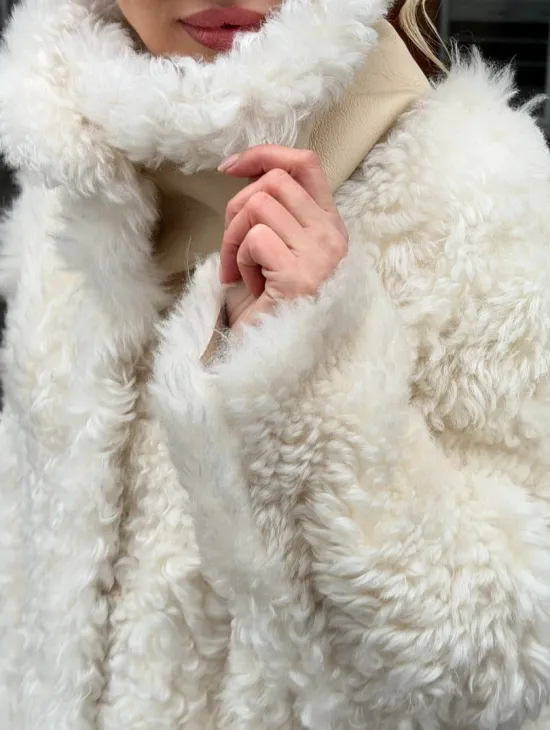 Белая шубка из тиградо - фото 3